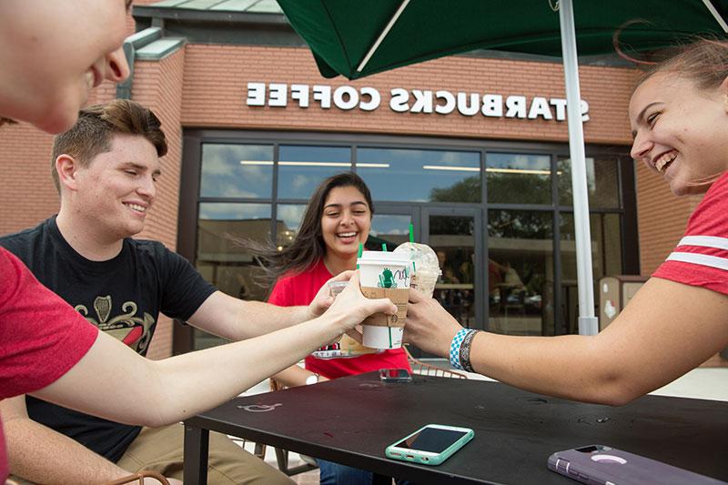 Students enjoying Starbucks at Gray Library